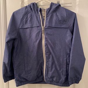 Water resistant lined boys rain jacket.Nice color and good quality.